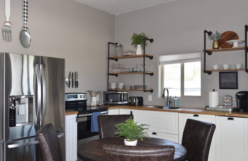 Peter Howell House | Centrally Located 2 Bed/1 Bath Home,Private Garage, Deck and Close to EVERYTHING