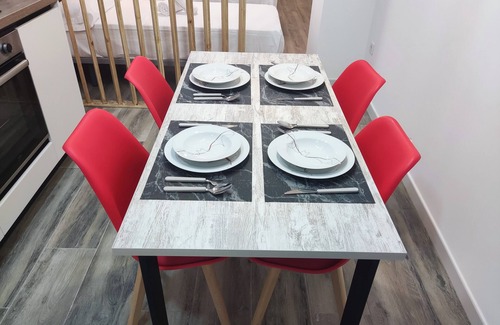 Ciudad Jardin Apartment | Centrally located, at street level and next to bus and train stations.