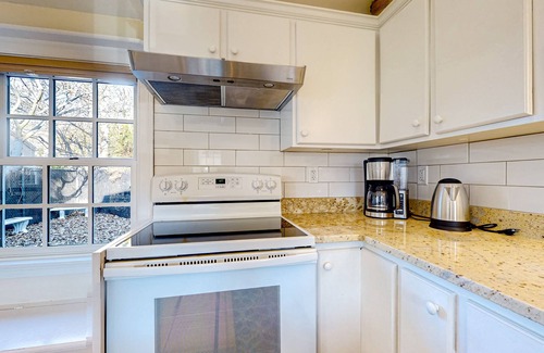Gloucester House | Centrally located charmer with expansive patio, board games, & central AC