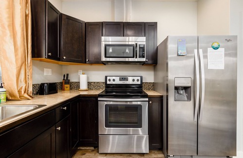 Eagle River Apartment | Centrally located, mountain-view retreat with private balcony, & washer/dryer