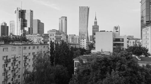 Mirow Apartment | CENTRUM PANORAMA STUDIO Złota 81 Street Warsaw by Gi4