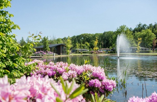 Municipality of Veldhoven Ski Chalet | Chalet by Pond in Eindhoven Holiday Park