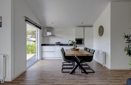 Municipality of Veldhoven Ski Chalet | Chalet by Pond in Eindhoven Holiday Park