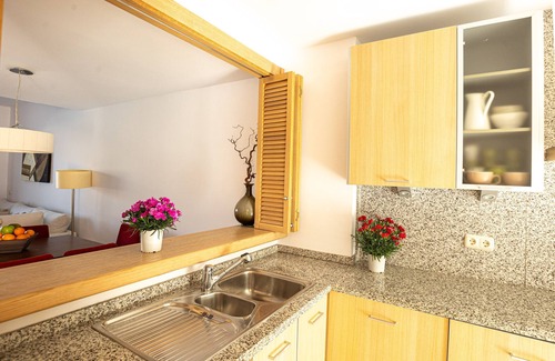 Mijas Ski Chalet | Chalet 'Comodo Triplex La Cala Golf' with Shared Pool, Wi-Fi and Air Conditioning