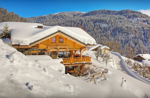 La Giettaz Ski Chalet | Chalet Crechoua - alpine home in Megève for 14, spa & slopes - OVO Network