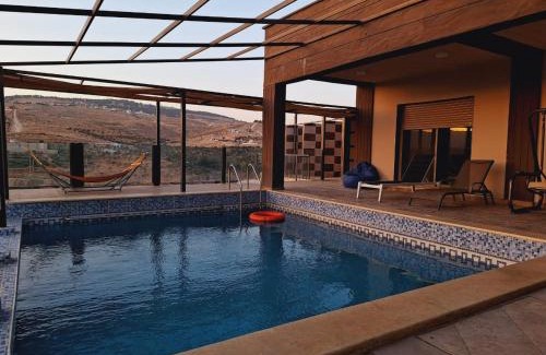 Suwailih Ski Chalet | Chalet with panoramic mountain view