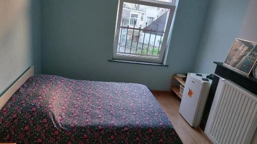Collignon House | Chambre confortable avec un lit double à schaerbeek cle bleu