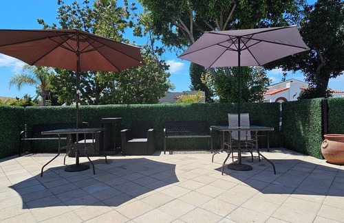 Harbor House | Chandelier, Marble Table & Beautiful Outdoor Spacen