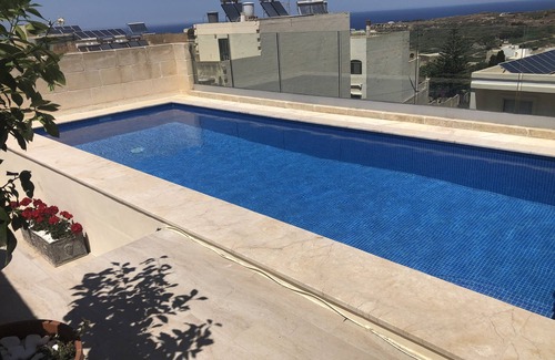 Xaghra House | Character farmhouse in Gozo with pool on roof terrace and fountain courtyard