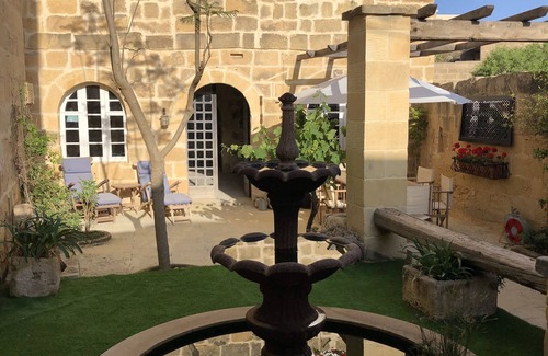 Xaghra House | Character farmhouse in Gozo with pool on roof terrace and fountain courtyard