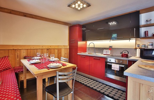 Courmayeur Apartment | Characteristic apartment on the central square of the Church of Courmayeur