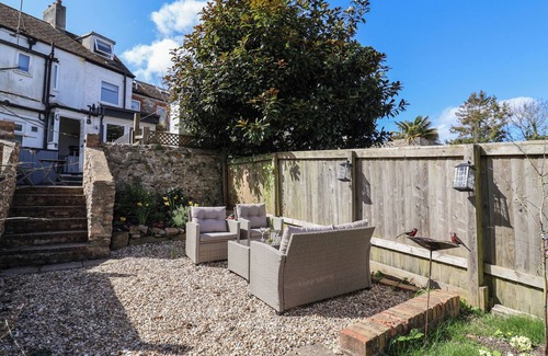 Charmouth Cottage | CHARLESTON COTTAGE, pet friendly, with a garden in Charmouth