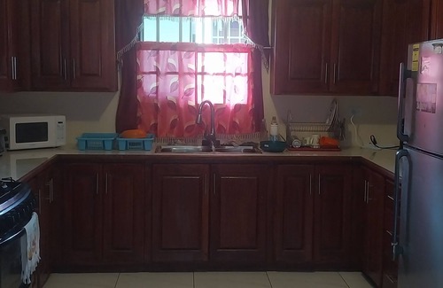 Piarco House | Charming 1-bedroom house with AC, WiFi in peaceful St. Helena Village Piarco