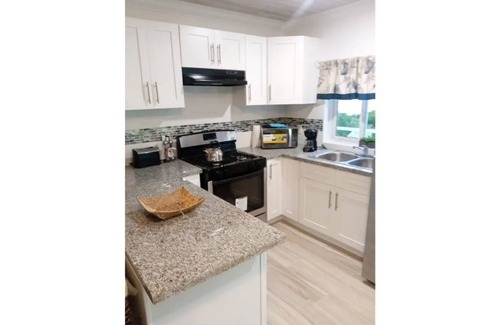 Great Harbour Cay Apartment | Charming 1-bedroom resort with indoor fireplace.