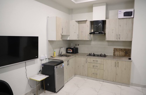 Bahria Town Apartment | Charming 1-bedroom apartment with AC, WiFi in nice Islamabad
