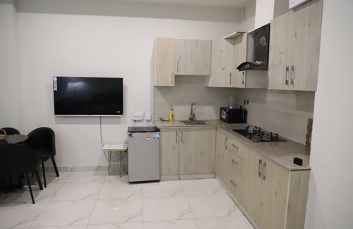 Bahria Town Apartment | Charming 1-bedroom apartment with AC, WiFi in nice Islamabad