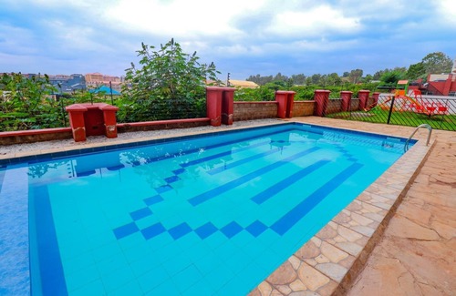 Kiambu Apartment | Charming 1-bedroom apartment in delightful Kiambu with Fast WiFi &Ample parking,