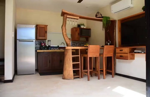 Rio Lagartos Apartment | Charming 1-Bedroom Apartment in Río Lagartos. AC, Rooftop Deck & Private Pier -Y