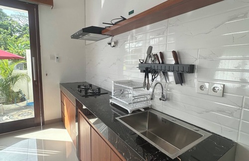 Kutuh Villa | Charming 1 bedroom private pool villa, living room and kitchen in southern Bali