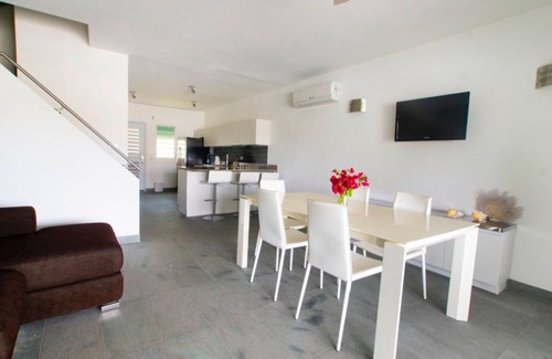 Jolly Harbour House | Charming 2-bedroom family friendly townhouse in Jolly Harbour with Golf Cart!