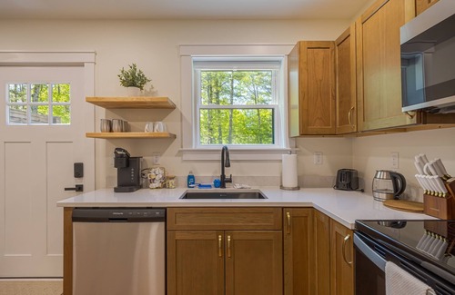 Ellsworth Apartment | Charming 2-bedroom apartment nestled in a quiet neighborhood with nearby stream.