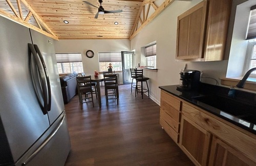 Logan Cabin | Charming 2-bedroom cabin with AC, WiFi, hot tub, and firepit in beautiful Logan