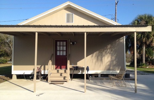 Chauvin Cottage | Charming 2-bedroom cottage in cool Chauvin with AC
