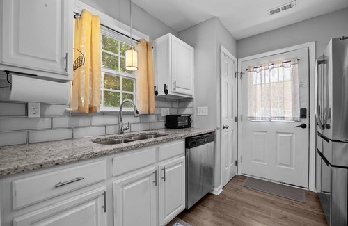 Wake Forest House | Charming 2-bedroom townhome in Wake Forest with assigned parking