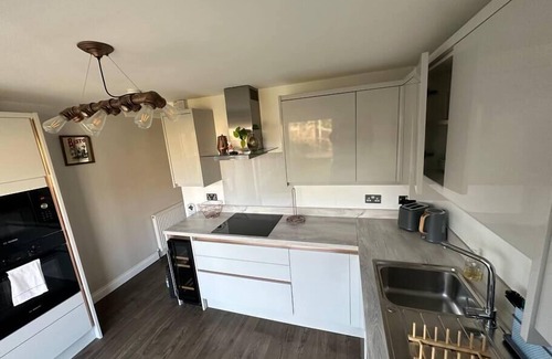 East Wickham Apartment | Charming 2-BR House offering WIFI, Parking and a Garden | On Site Stays Welling