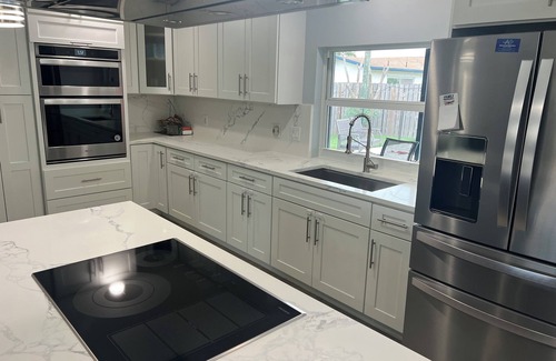 Sunrise House | Charming 3/2 house with heated pool/spa, just 2 miles from Sawgrass Mills Mall!
