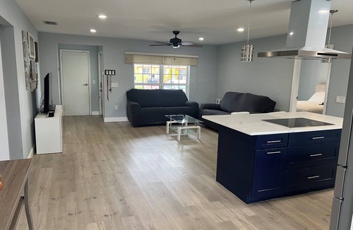 Sunrise House | Charming 3/2 house with heated pool/spa, just 2 miles from Sawgrass Mills Mall!