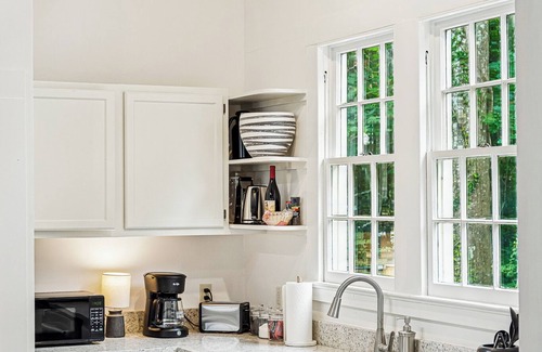 Covington Cottage | Charming 3-bedroom cottage steps away from shopping, dining.
