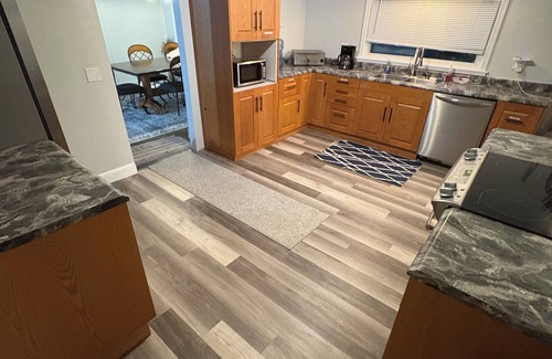 Amherst Apartment | Charming 3-bedroom main floor apartment 5 minutes from Sandlake Wild life refuge