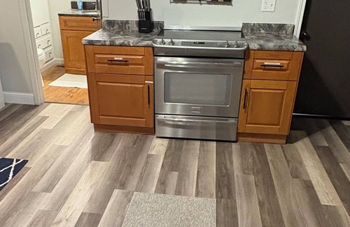 Amherst Apartment | Charming 3-bedroom main floor apartment 5 minutes from Sandlake Wild life refuge