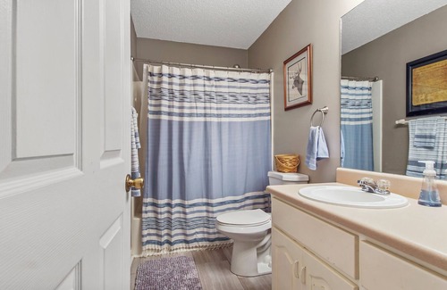 Thomas Drive House | Charming 3-bedroom Riverfront house with WiFi, AC in Panama City Beach FL