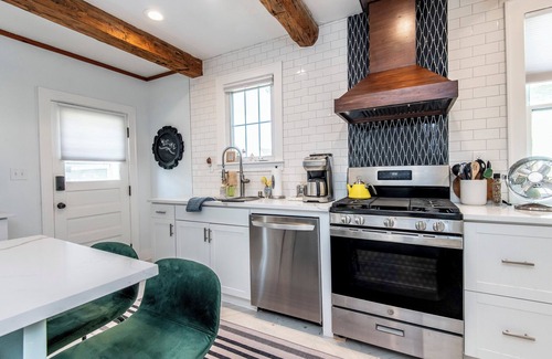 Village of Pewaukee House | Charming 4-bedroom house steps from Pewaukee Lake Beach, shops & restaurants
