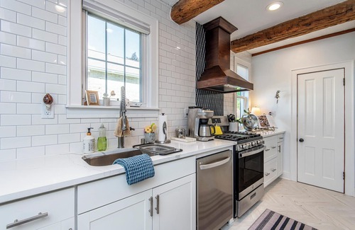 Village of Pewaukee House | Charming 4-bedroom house steps from Pewaukee Lake Beach, shops & restaurants
