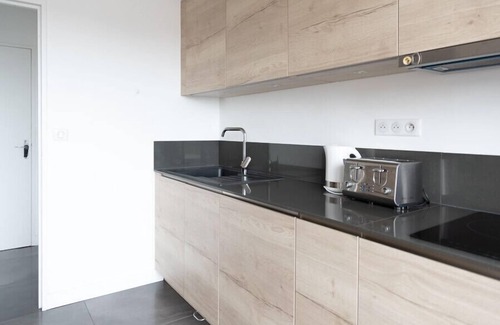 Prince–Marmottan Apartment | Charming Apt with a view of the Eiffel Tower