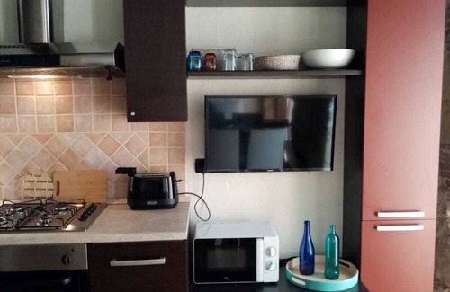 Cagliari Apartment | Charming and bright apartment in a 1900 building (wooden roof and stone walls)