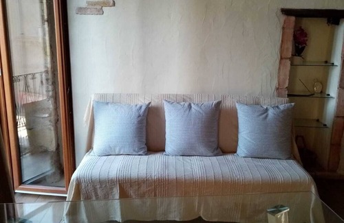 Cagliari Apartment | Charming and bright apartment in a 1900 building (wooden roof and stone walls)