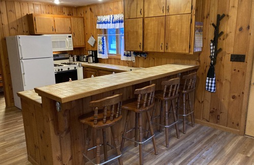 Lac du Flambeau Cottage | Charming and Cozy, 4-Season, Fence Lake Cottage with Beautiful Sunset View