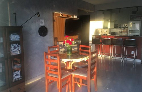 Praia Grande Apartment | Charming apartment with AC and ocean view.