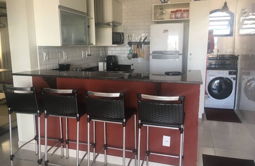 Praia Grande Apartment | Charming apartment with AC and ocean view.