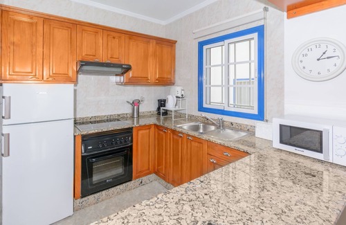 Arrieta Apartment | Charming Apartment Close to Beach with Patio, Wi-Fi & Mountain Views