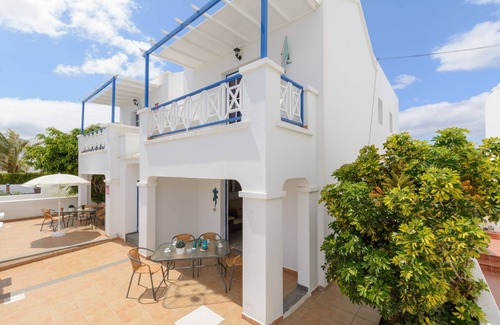 Arrieta Apartment | Charming Apartment Close to Beach with Patio, Wi-Fi & Mountain Views