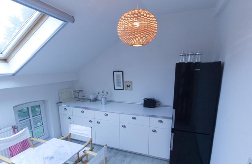 Langen b. Bremerhaven Condo | Charming apartment in a historic building directly behind the dike!