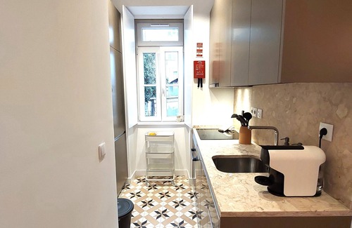 Penha de Franca Condo | Charming Apartment in a Private Condominium at Graça