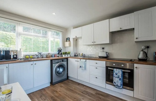 Pembroke House | Charming Beach Chalet with Balcony & Sea Views