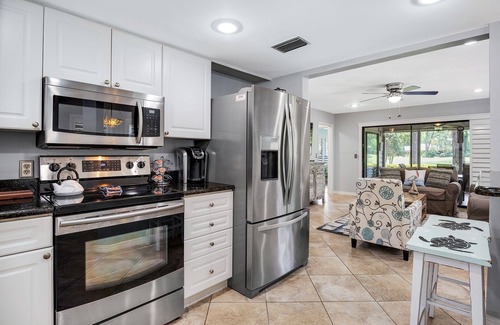 Miramar Beach Condo | Charming Beach Cottage with GOLF CART! Golf Course View, Screened Porch, Pool
