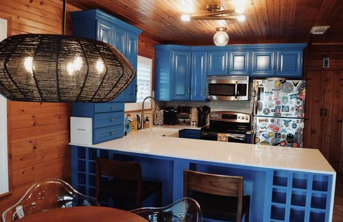 Galveston House | Charming Canal-Front Surf Shack – Dog Friendly and Cozy Retreat!